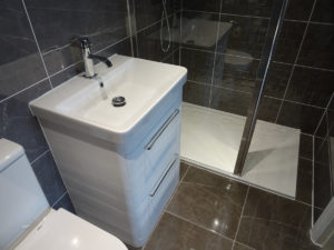 Fully Tiled Ensuite in Coventry with Feature tiled wall
