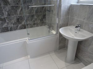 Bathroom in Coventry with L Shaped Shower Bath