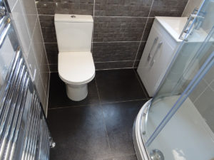 Shower room in small bathroom in Coventry fully tiled