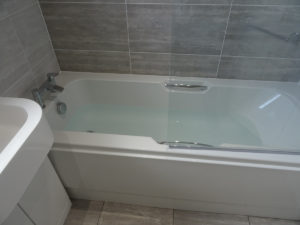 Bathroom fitted in Coventry with Trojan Granada bath with handles