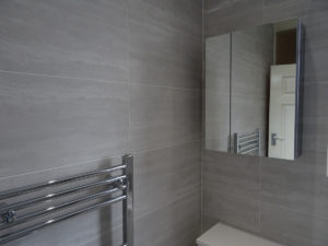 Modern Bathroom Fitted In Coventry with wall mounted mirror cabinet