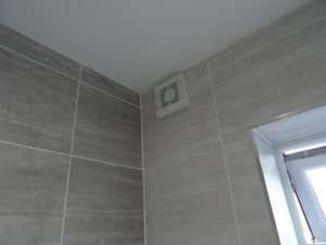 Bathroom fitted in Coventry fully tiled with wall extractor fan