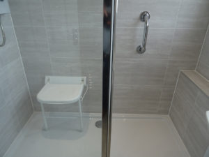 Mobility shower room Coventry with wall mounted shower seat
