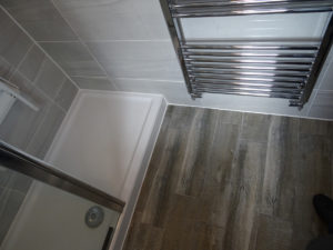 Mobility Bathroom with wood effect tiled floor